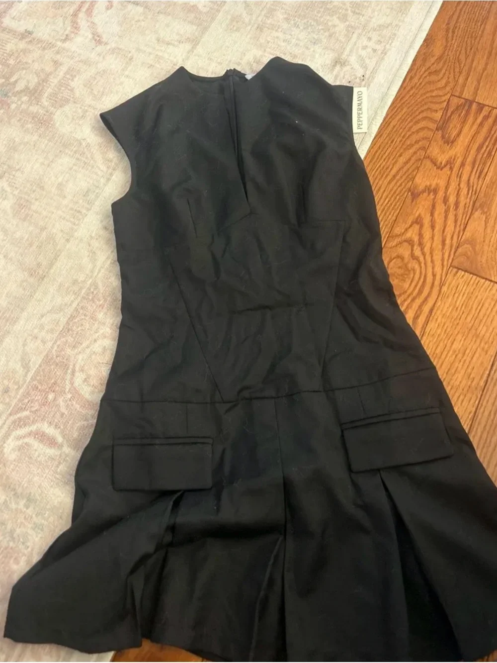 Peppermayo Black Sleeveless Mini Dress with Plunging Notch